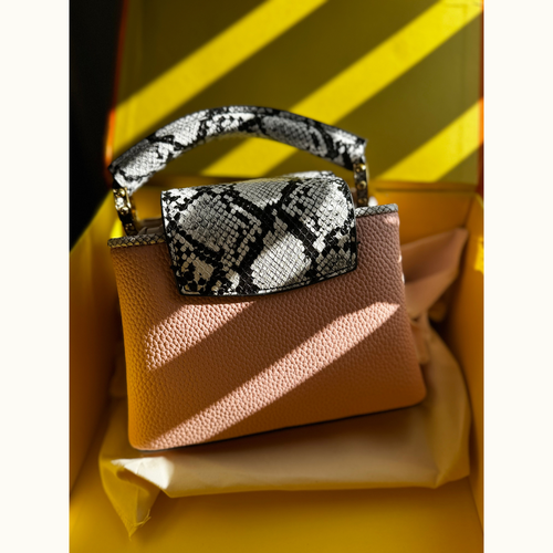 L baby pink snake print purse